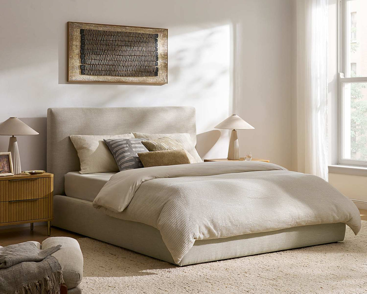 Miyo low upholstered bed in oat in a calm Japandi bedroom