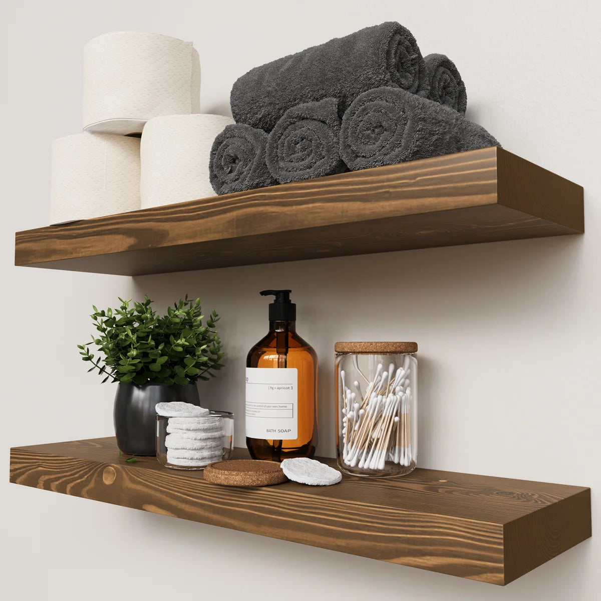 Baobab walnut floating shelves in a bathroom with towels and plants