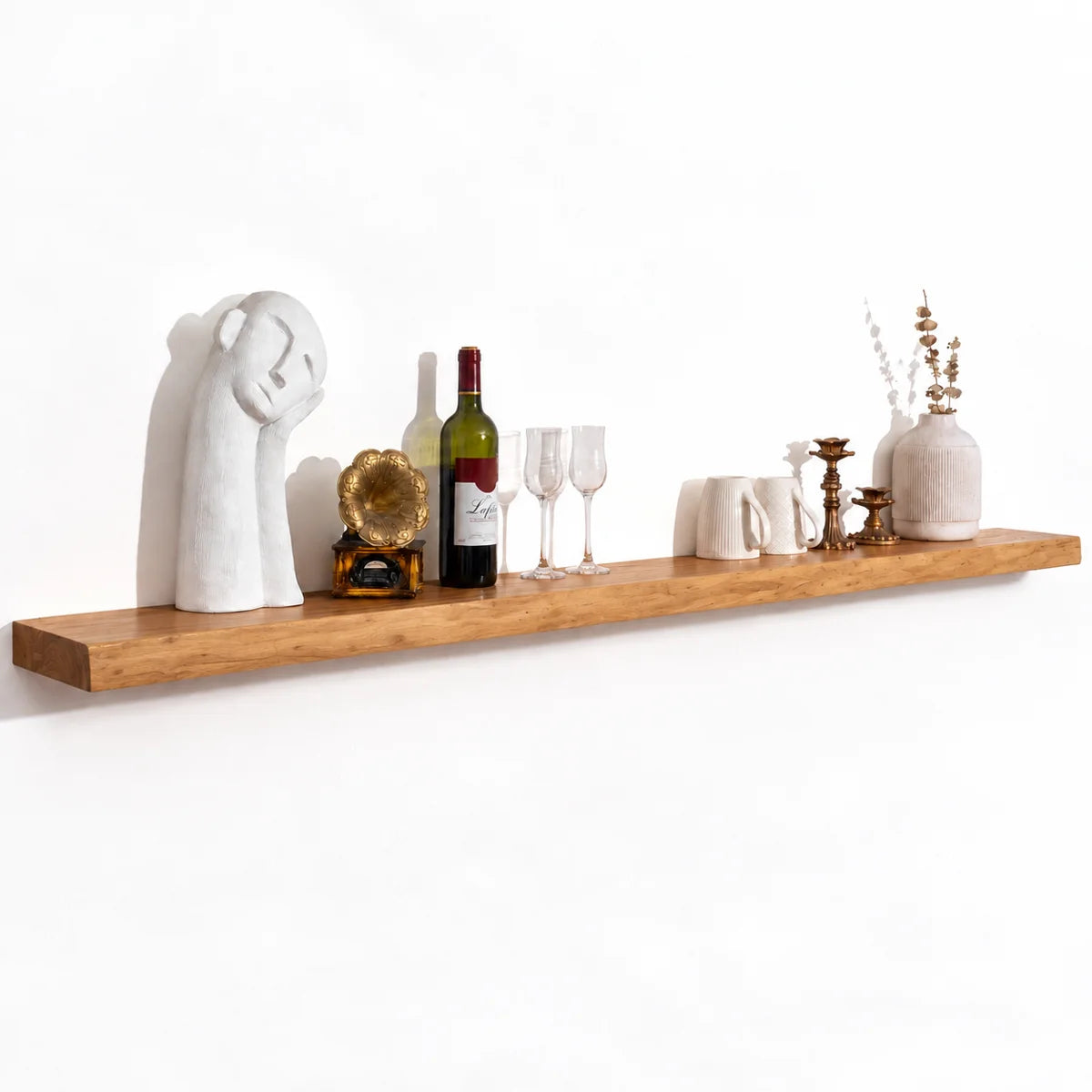 Carsin 72 inch reclaimed elm floating shelf with vases
