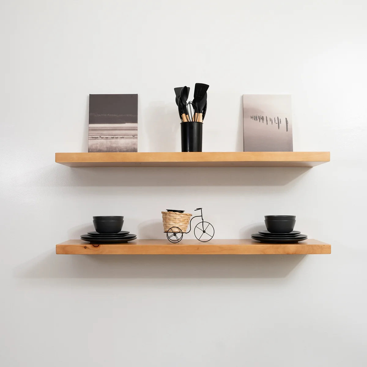 Haby oak floating shelves with art prints and tableware