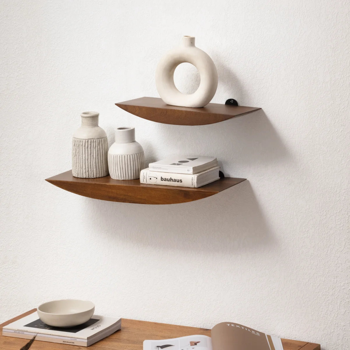 Oiva shelves styled with ceramic vases