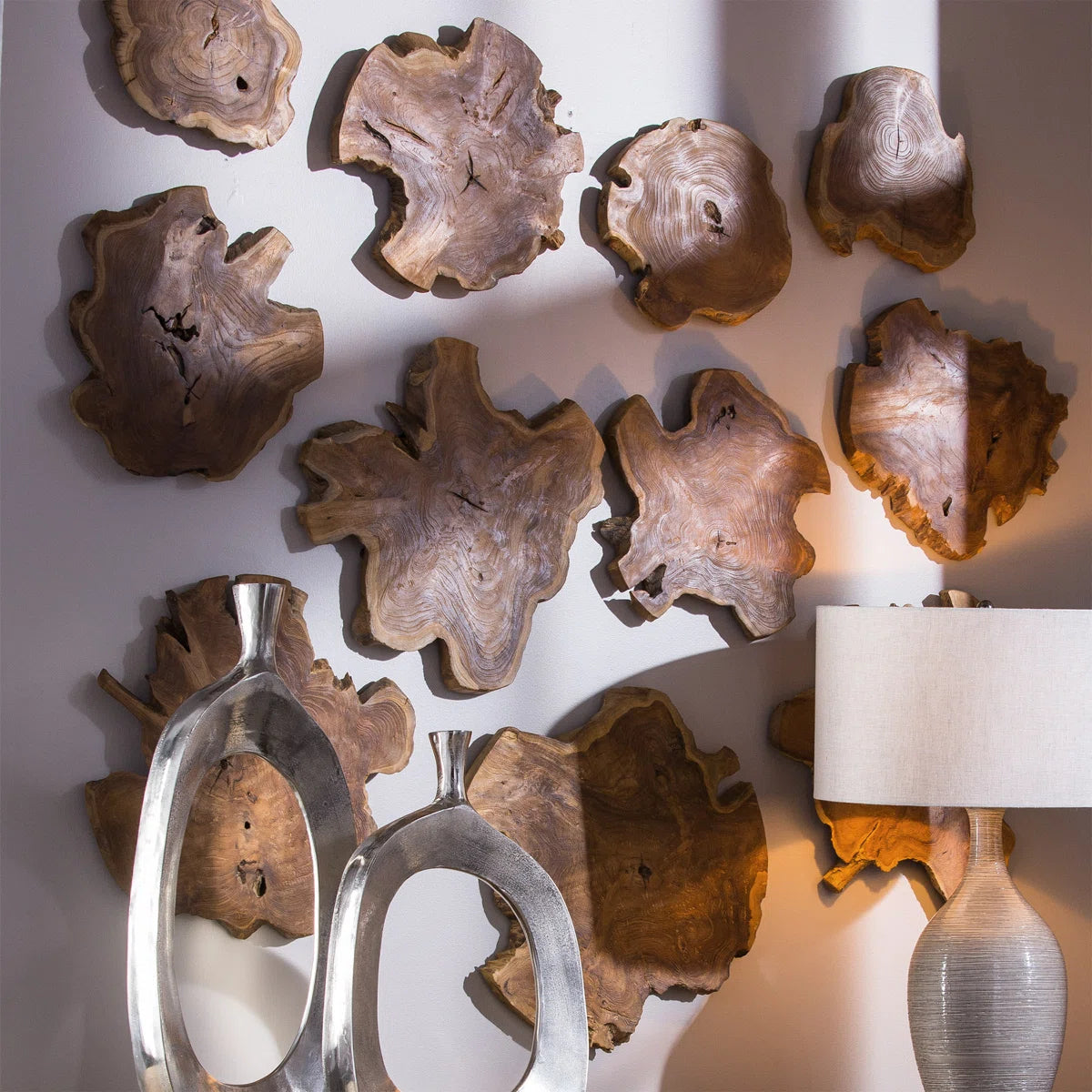 Teak wall decor styled with vases