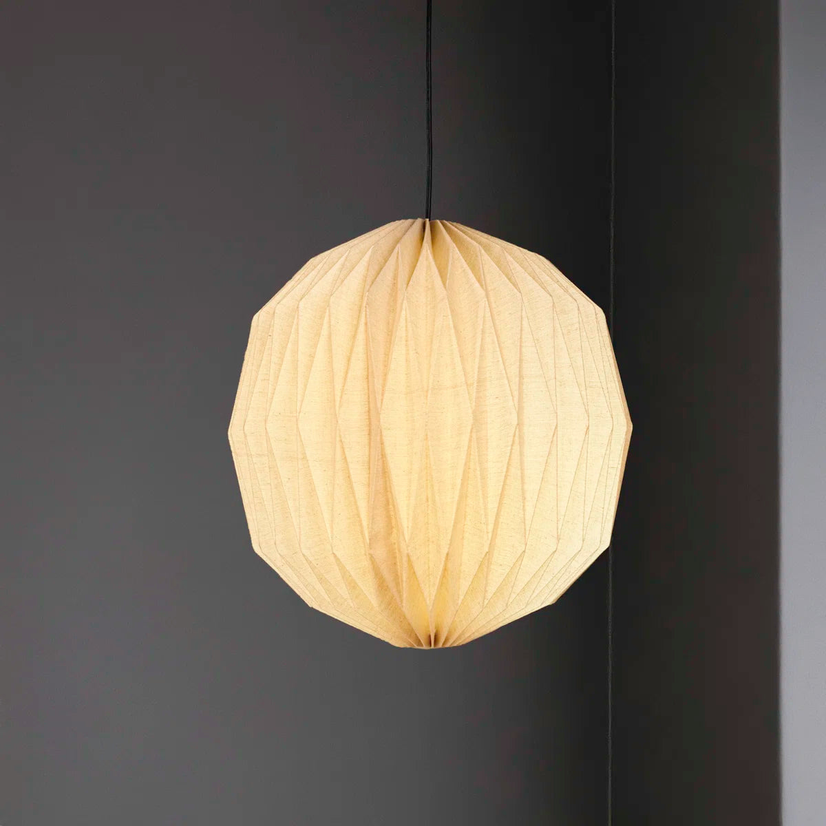 Vaughn honeycomb paper pendant switched on