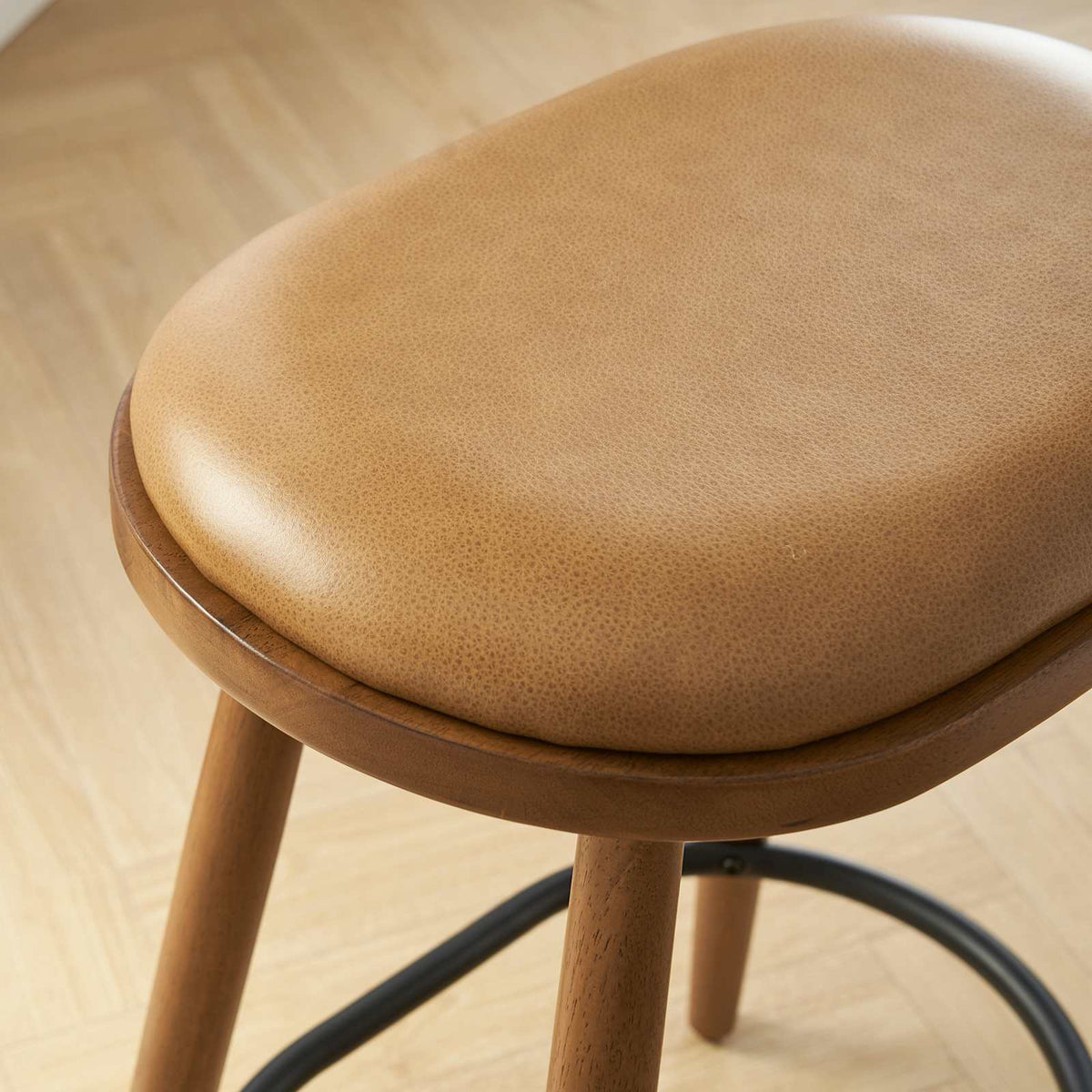 Japandi Leather Backless Counter Stool - Abel – at a kitchen counter