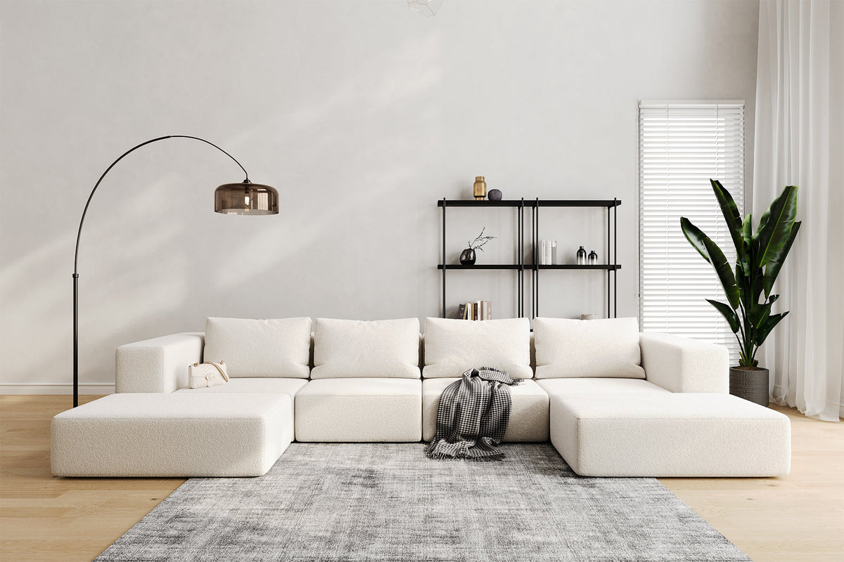 Japandi Modular Sectional Sofa in white boucle with armless seats and ottomans