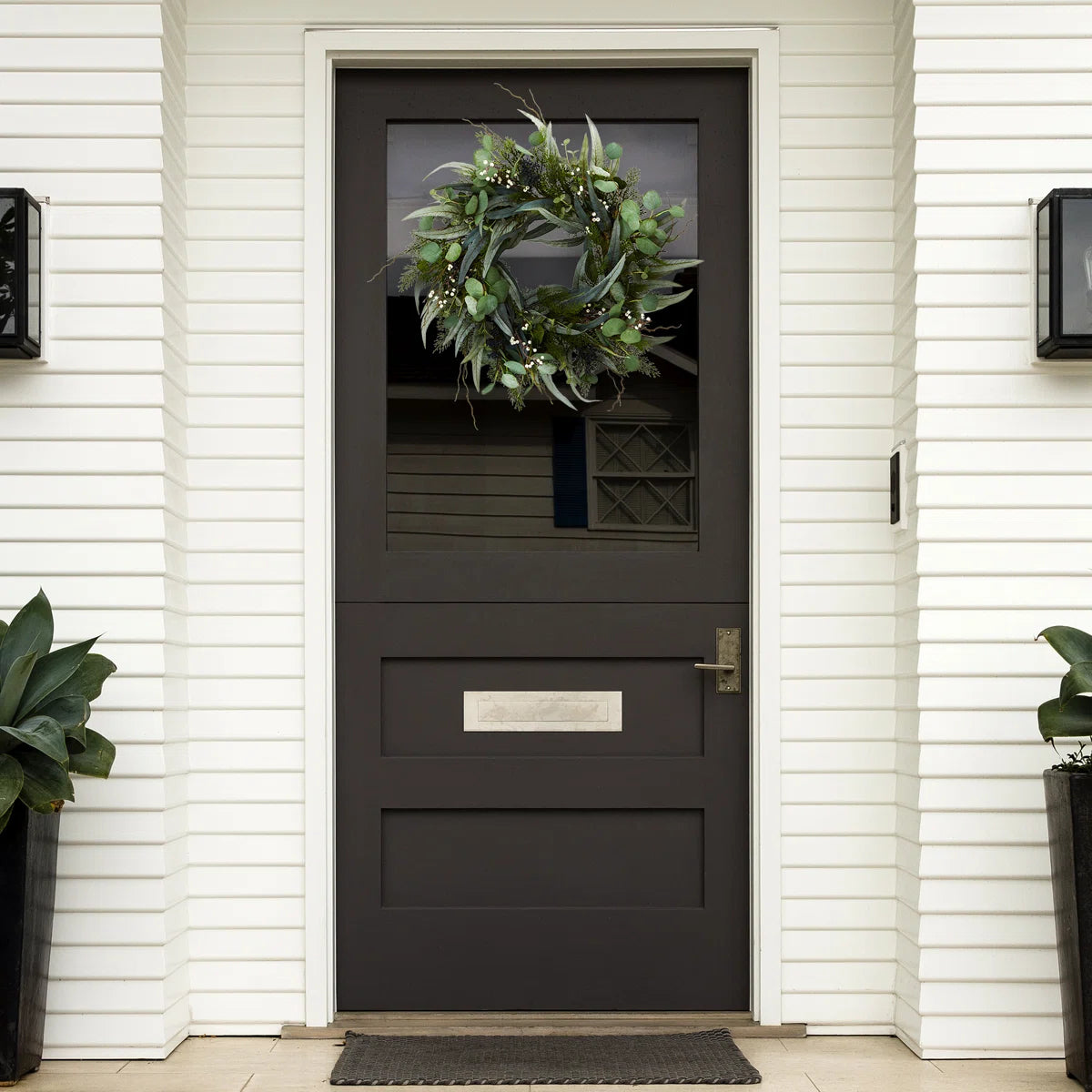 Eucalyptus wreath on a black door