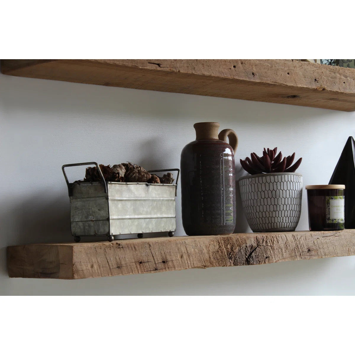 Joao shelves with decor on a white wall