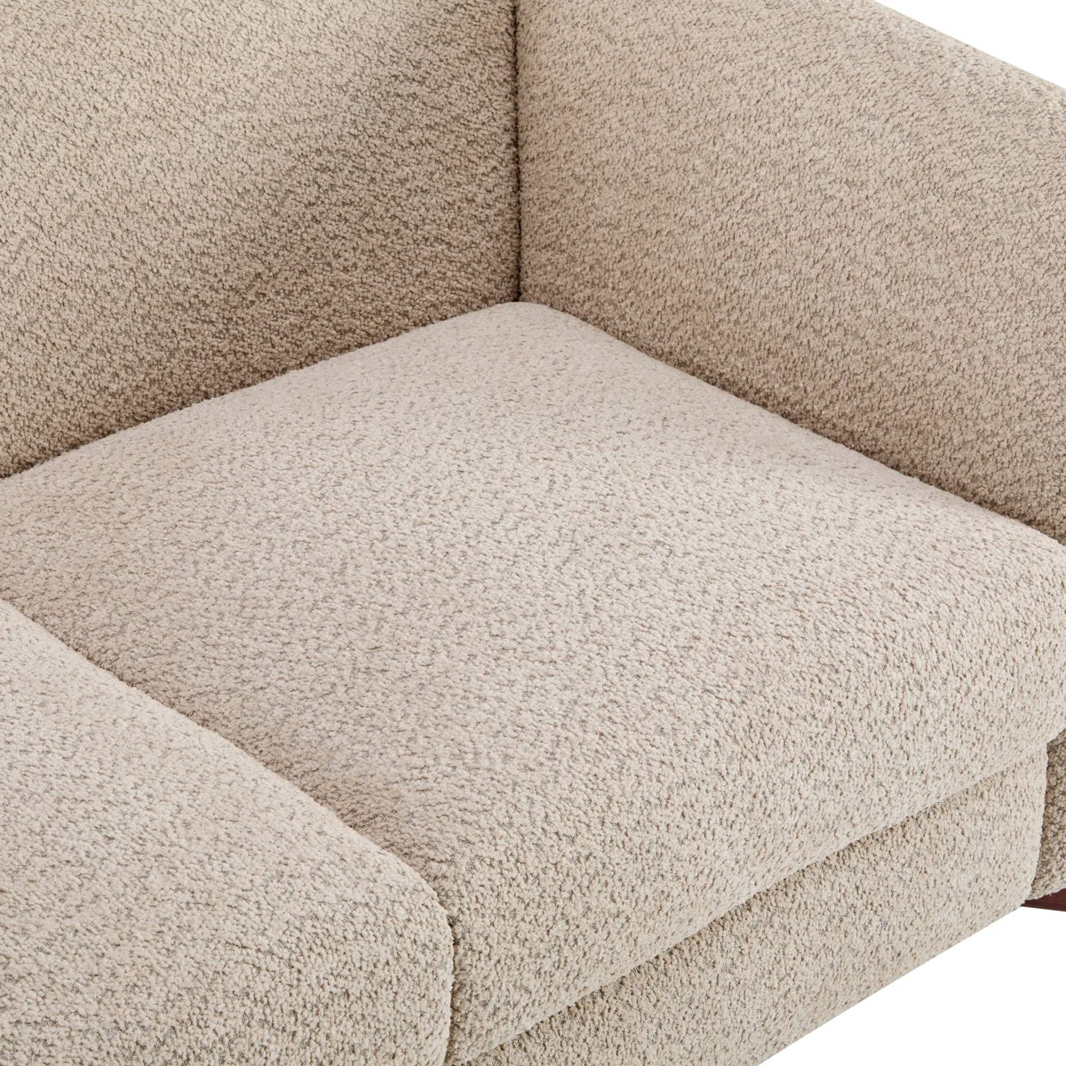 Close-up of the almond boucle seat cushion