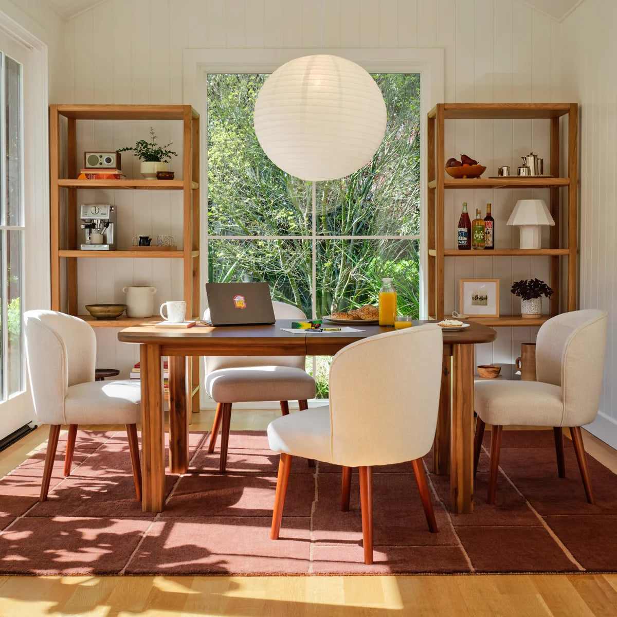 Workshop paper lantern pendant in a dining room, daytime